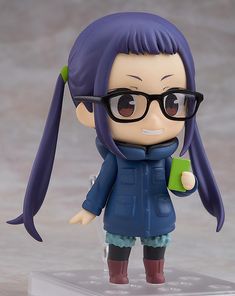 a figurine with glasses holding a cup