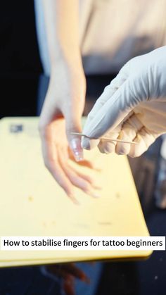 a person in white gloves is preparing food on a cutting board with the words how to stabilize fingers for tattoo beginners