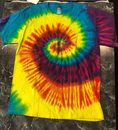 Vintage T Shirt- Colorful Camp Style Tie-Dye Hippy Happy Love NOS Size M Hanes Size: M Pit To Pit: 18” ''Shoulder To Bottom: 25” Backstock#749A May have storage stains or creases please see photos SHIPPING DETAILS***IN HAND & WILL SHIP WITHIN 24 HOURS (1 BUSINESS DAY) OF RECEIVING PAYMENT. I WILL HAPPILY SHIP INTERNATIONALLY BUT BUYER WILL BE RESPONSIBLE FOR ANY ADDITIONAL CUSTOMS FEES, TAXES ETC. CHECK MY FEEDBACK AND PURCHASE WITH CONFIDENCE!***PAYMENT DETAILS***PAYPAL ONLY. PLEASE PAY WITHIN Fun Multicolor Pre-shrunk T-shirt, Summer Tie Dye T-shirt With Rainbow Print, Pre-shrunk Cotton Rainbow T-shirt, Summer Multicolor T-shirt With Rainbow Print, Cotton Tie Dye T-shirt With Rainbow Print, Multicolor Relaxed Fit Pre-shrunk T-shirt, Multicolor Cotton T-shirt With Screen Print, Hippie Multicolor Graphic Print T-shirt, Colorful Fun Cotton T-shirt