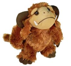 a stuffed monkey with a hat on it's head and the words ludo written below