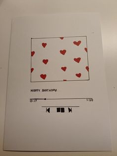 a birthday card with red hearts on it