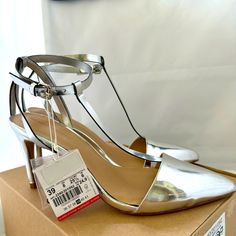 Zara Basic New Silver T Strap Heeled Sandal. Us 8 3.5” Heel & 3/8” Platform. One Small Ripple On Right Sandal Just Before Sole. I Have A Pair Of These I Wear And They Are Great, They Go With Everything And Are Comfy Too. Feel Free To Ask Any Questions You Might Have. I Pack Well And Ship Quickly. Thank You For Looking Silver Ankle Strap Kitten Heels For Summer, Zara Formal Sandals With Low Heel, Silver Open Heel Kitten Heels For Spring, Zara Sandals For Summer, Zara Formal Closed Toe Sandals, Zara Open Toe Heels For Wedding, Zara Ankle Strap Fitted Heels, Zara Ankle Strap Heels, Zara Fitted Closed Toe Heels