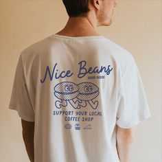 Nice Beans shirt is out now and available on the website (link in bio). Available in white and navy colors. ☕️⁠ --⁠ #digitalart… | Instagram Cool Merch Ideas, Restaurant Merch, T Shirt Drawing, Tshirt Merch, Streetwear Tshirts, Pet Cafe, T Shirt Illustration, Coffee Cartoon, T-shirt Design Illustration