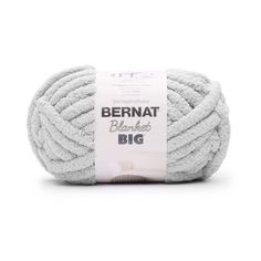 bernat blanket big yarn ball in grey, white and gray colors on a white background