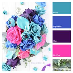 the color scheme is blue, pink, and purple with flowers in it on a white wooden background