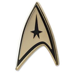 a star trek insignia pin with a black and gold design on the bottom of it