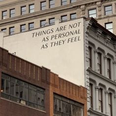 there is a sign that says things are not as personal as they feel on the side of buildings