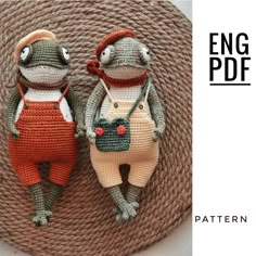 two crocheted frog dolls standing next to each other