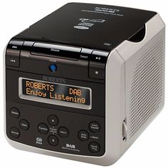 an alarm clock radio sitting on top of a table