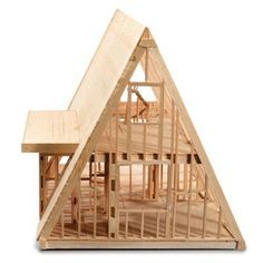 a wooden model of a house under construction