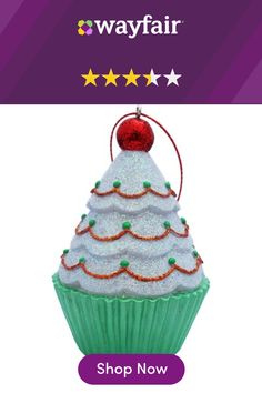 a christmas cupcake ornament is shown with stars on the top and bottom