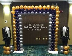 balloon arch with black, gold and silver balloons in front of the sign that says 11 & k creations balloon artist classes