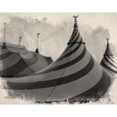 three large striped tents sitting next to each other