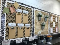 several bulletin boards are arranged on the wall