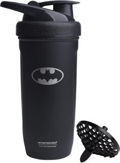 the batman shaker bottle is next to a strainer