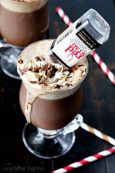 two glasses filled with ice cream and chocolate