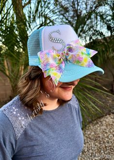 What an adorable addition to an outfit! Get this hat with any initial you like :) These TWO STYLES of trucker hats are both customized with a glittery, rhinestoned initial, and then have been adorned with a cute, and colorful tie dye bow which has also been finished with 3 rhinestones on the corner for the perfect finishing touch. Each hat is adjustable on the backside with a pop/snap closure. Pink/Purple Hat Blue Hat and a Solid White Hat are all available Playful Blue Hats For Gifts, Playful Blue Hat For Gift, Playful Blue Hat As Gift, Playful Blue Hat As A Gift, Blue Cap Hat As A Gift, Blue Cap As Gift, Blue Cap As A Gift, Fun Blue Hats For Gifts, Cute Personalized Hats