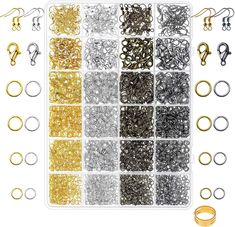 a bunch of different types of rings and chains on a white background with clippings