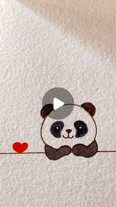 a panda bear with a red heart on it's chest