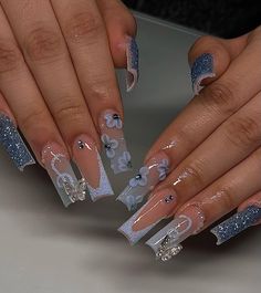 blue nails inspo glitter nails long square nails silver charms prom nails nail inspo long nails medium square nails butterfly nails Birthday Nail Ideas, Cinderella Nails, Glamorous Birthday, Blue Prom Nails, Acrylic Nails Ideas, Blue And Silver Nails, Birthday Nail Designs