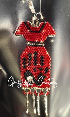 These beautiful Red Dress Earring represent so much meaning, and will look fabulous on. Buy one today. Red Jingle Dress, Red Dress Earrings, Red Beaded Dress, Jingle Dress, Dress Earrings, Seed Bead Jewelry Patterns, Stitch Earrings, Beautiful Red Dresses, Beaded Earrings Diy