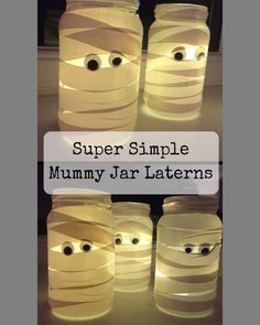 some jars that have faces on them with the words super simple mummy jar lanterns