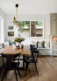 the kitchen is clean and ready to be used as a breakfast nook or seating area