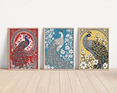 three peacocks are shown in four different colors on the wall above a wooden floor