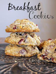 three cookies stacked on top of each other with the words breakfast cookies in the background