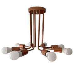 four light fixtures with white and brown bulbs