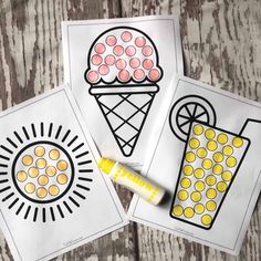 three ice cream coloring pages with crayons and markers on the paper next to them