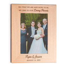 a family photo frame with the words, all that we are and hope to be is one