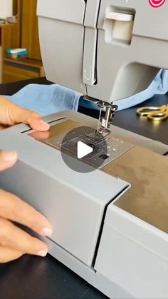 someone is using a sewing machine to sew something