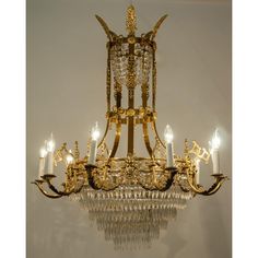 a fancy chandelier with many candles in it