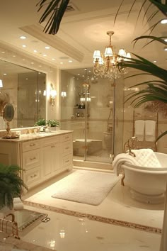 a large bathroom with a tub, sink and shower