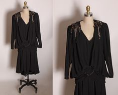 "1980s Does 1920s Drop Waist Flapper Style Beaded Flowers Shoulder Detail Black Dress by Casadei This dress features: *Black color *Inner shell *Drop waist *Beaded gold floral details on shoulders *Pullover, no closures  *Flapper style  Label: Casadei Size: Small  Measurements: Bust: 35\" Waist: 33\" Hip: Open Length: Roughly 47\" Condition: Excellent If you have any questions, please ask! Find even more Vintage Smalls at: https://www.etsy.com/shop/NaughtyKittyVintage?section_id=17610195&ref=shopsection_leftnav_7 Thanks! -NaughtyKittyVintage" Cat Print Dress, Detailed Black Dress, Flapper Style Dresses, Velvet Cocktail Dress, Cocktail Dress Vintage, Flapper Style, Silk Floral Dress, 80s Dress, Fabulous Dresses