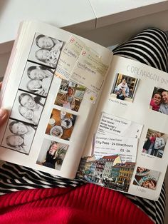 a person is holding an open book with pictures on it and the pages are covered in photos