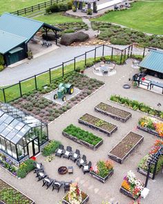 an aerial view of a vegetable garden with tables and chairs