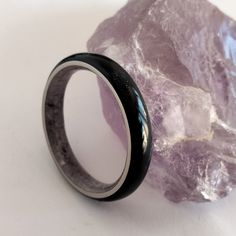 Nickel free ring, Black Tourmaline ring, Round band, Mens Amethyst band, Male rings, Male jewelry, Unisex ring, Womens engagement band. "Stone style" is the new 2022 collection of Woodlife jewelry The outside of the ring is made of Black Tourmaline Stone Powder, the inside of the ring is made of Natural Amethyst stone. Both materials are supported by a Titanium band, which ensures the quality of the ring. The ring in the photograph is 4mm wide. This can be customized. Customize your ring by choo Rings Marriage, Rings Male, Male Rings, Marriage Rings, Unisex Rings, Wedding Band Black, Male Jewelry, Black Tourmaline Stone, Stone Powder