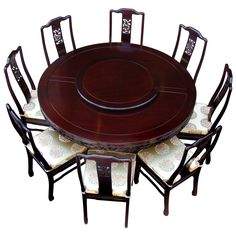 a dining table with six chairs and a round wooden table on one side, surrounded by white cushions