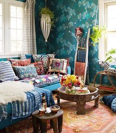 a living room filled with lots of colorful furniture