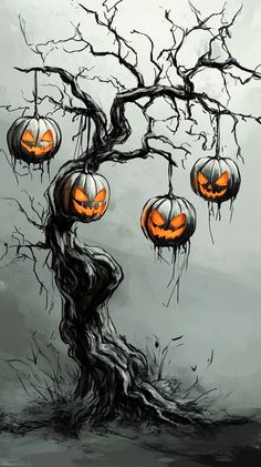 a tree with pumpkins hanging from it's branches in front of a cloudy sky