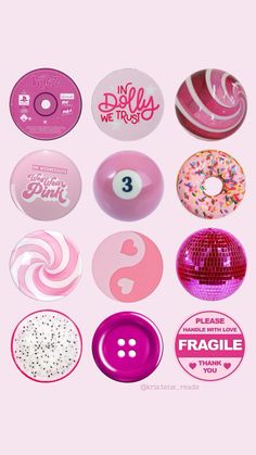 various donuts are arranged on a pink background