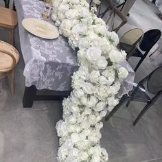 the table is covered with white flowers