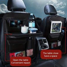 the back seats of a car with various items in it