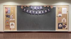 a bulletin board with the word, old testament on it and some pictures hanging above it