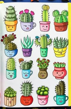 an open notebook with cactus and succulents on it