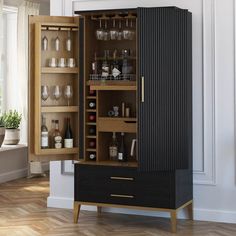 an armoire with wine glasses and bottles in it