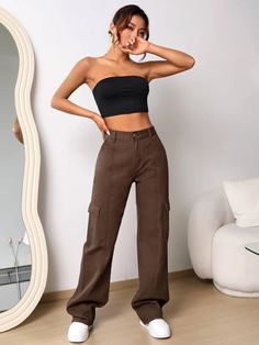 Elevate your denim game with our High Waist Cargo Jeans. These jeans feature a high waistline that flatters your figure and adds a trendy touch. With cargo-style pockets, they offer both style and functionality. Made from premium denim, these jeans provide comfort, durability, and a fashion-forward look. Perfect for adding an edgy twist to your casual outfits, our High Waist Cargo Jeans are a must-have in your wardrobe. Details: Color: Brown Pattern Type: Plain Type: Wide Leg Jeans Style: Cargo Brown High-waist Jeans For Streetwear, High-waisted Brown Jeans With Pockets, Trendy Straight Leg Non-stretch Cargo Jeans, Trendy Non-stretch Straight Leg Cargo Jeans, Fall Utility Flare Jeans, Trendy Brown High-waist Jeans, Trendy Brown High Waist Jeans, Trendy High Waist Brown Jeans, Trendy Cargo Style Jeans For Fall