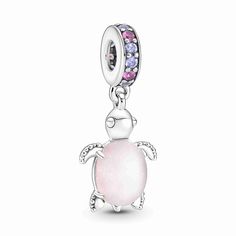 Our much-loved sea turtle charm is joined by a new friend in frosted pink. This sterling silver dangle charm features pink and purple man-made crystals on the bail and frosted Murano glass as its shell with unique shimmering flecks that catch the light. The belly of the sea turtle has a sterling silver cut-out pattern with an off-center heart to create a pretty scale-like effect. Carry more turtle friends on your Pandora Moments bracelet or charm holders. Pink Sea Turtle, Pandora Charms Pink, Pandora Bracelet Charms Ideas, Pandora Murano, Pandora Pink, Pink Charm, Charms Pandora, Pink Sea, Bracelet Pandora